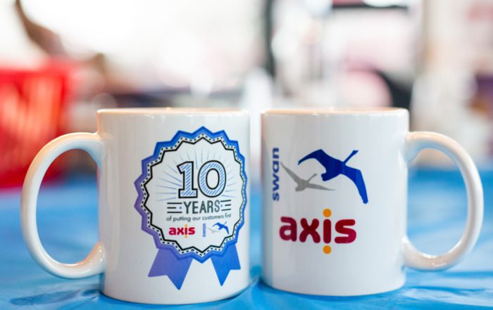 Axis and swan dual branded cups to celebrate a long standing client relationship