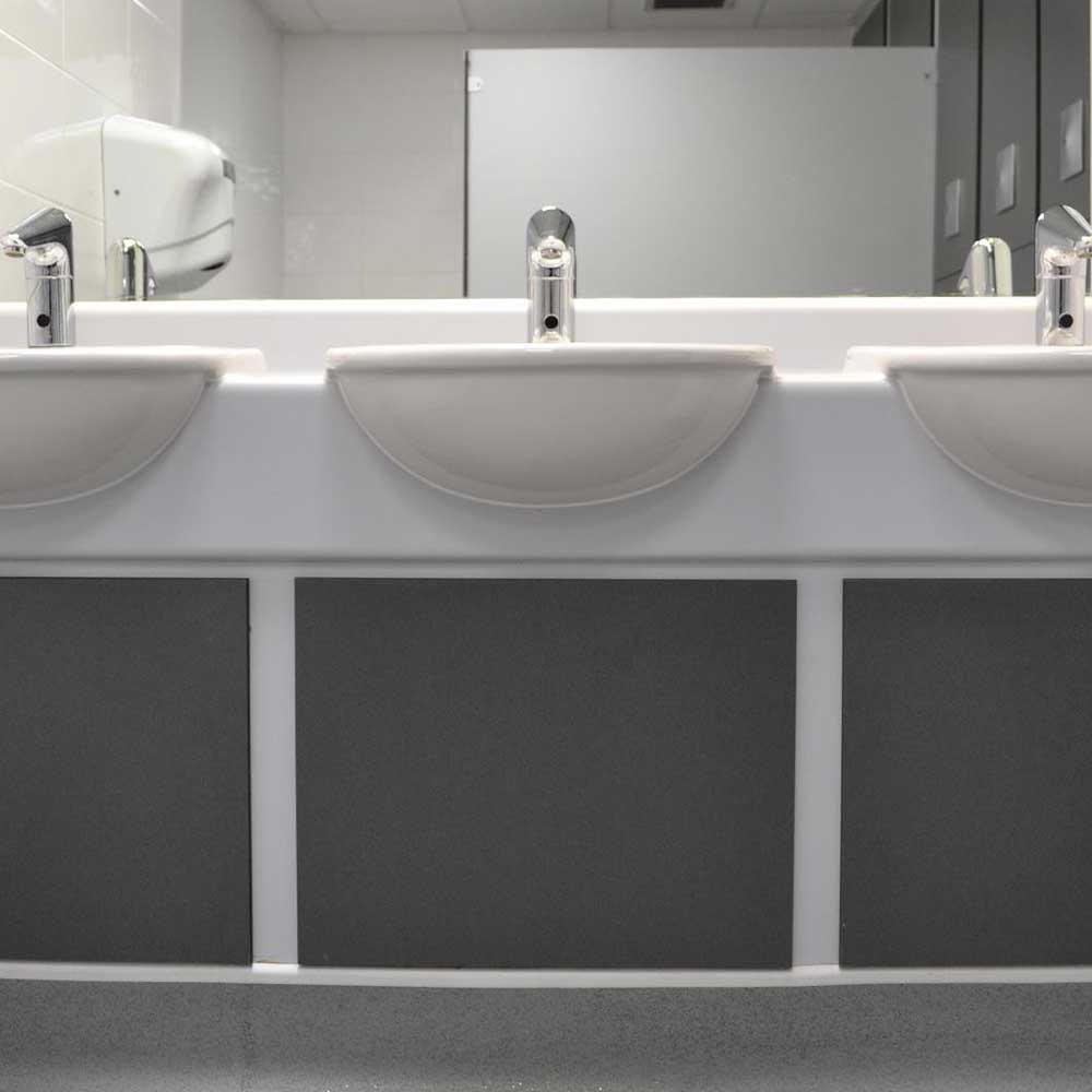 Sinks inside a bathroom space at an education center