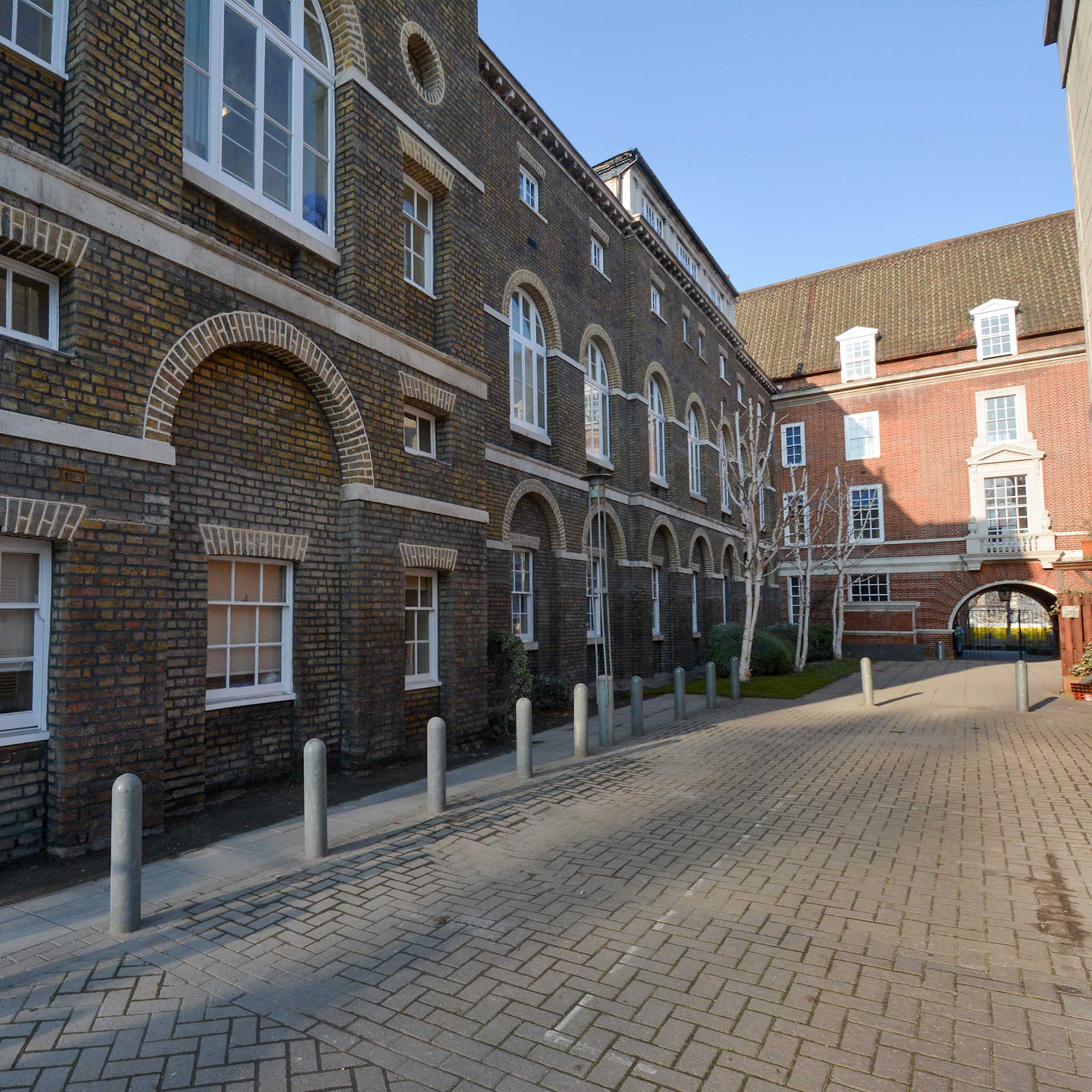 a street inside greenwich university that leads to an archway axis europe carried out works at the university including refurbishment