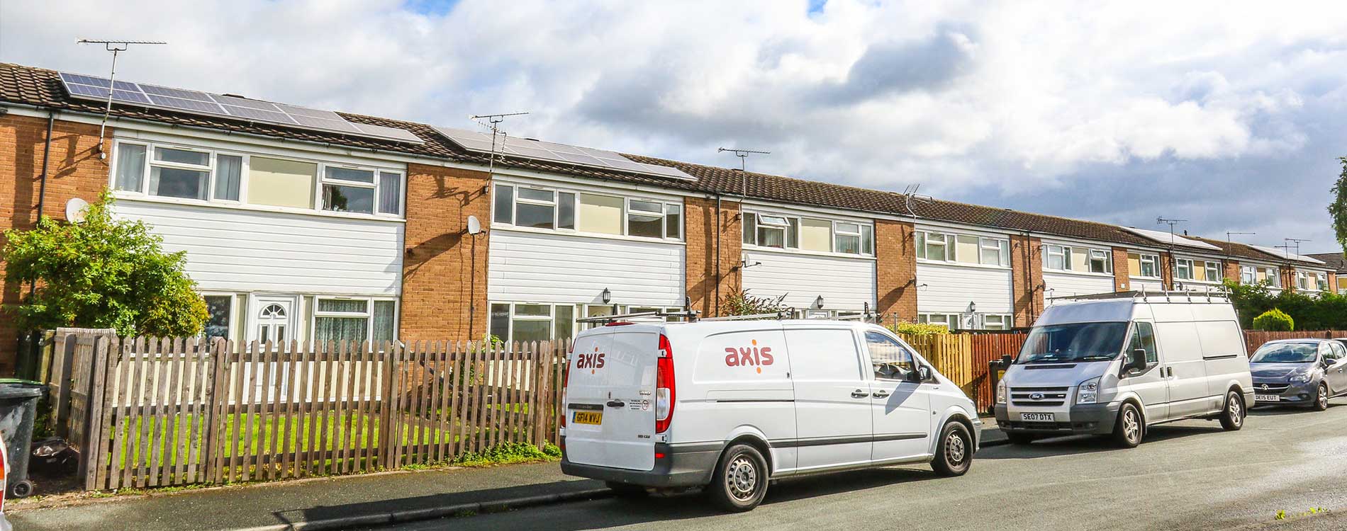 Axis Van on a street outside a property in wrexham that is serviced by axis