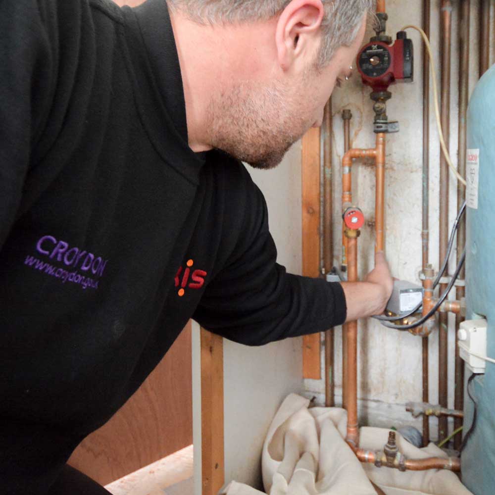 Gas engineer working on a property in Croydon on a voids repairs job