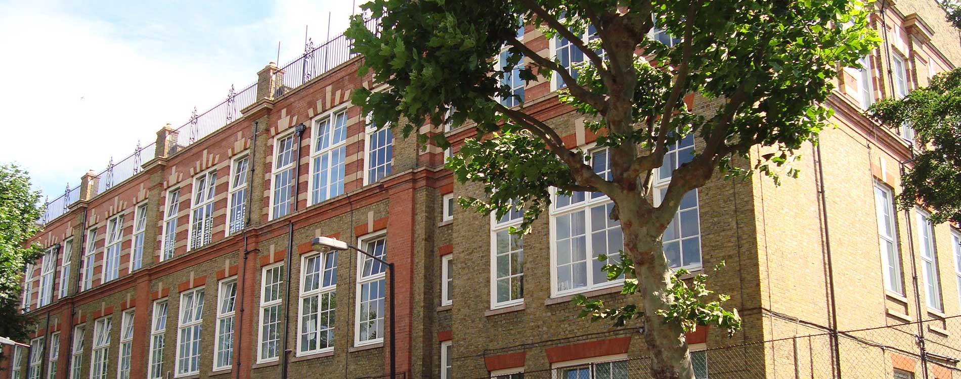 Historic london school with playground on the roof looks rejuvenated after the renovation works carried out by Axis