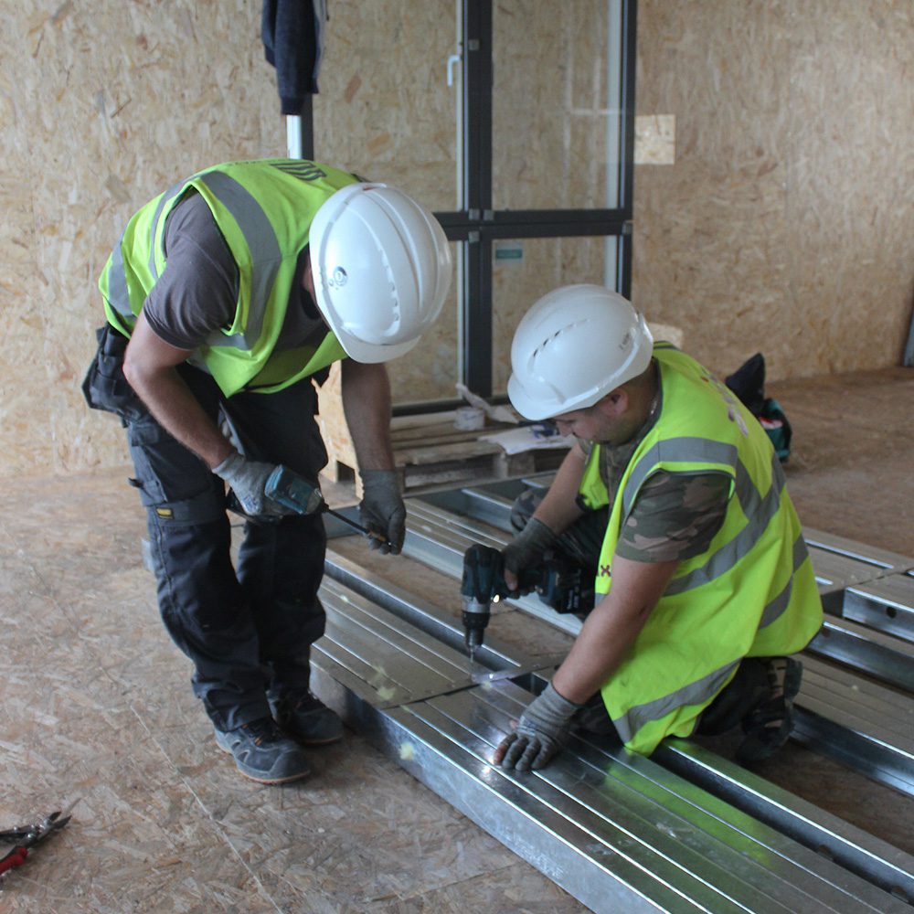 Subcontractors jobs Axis subcontractors working on a job on site