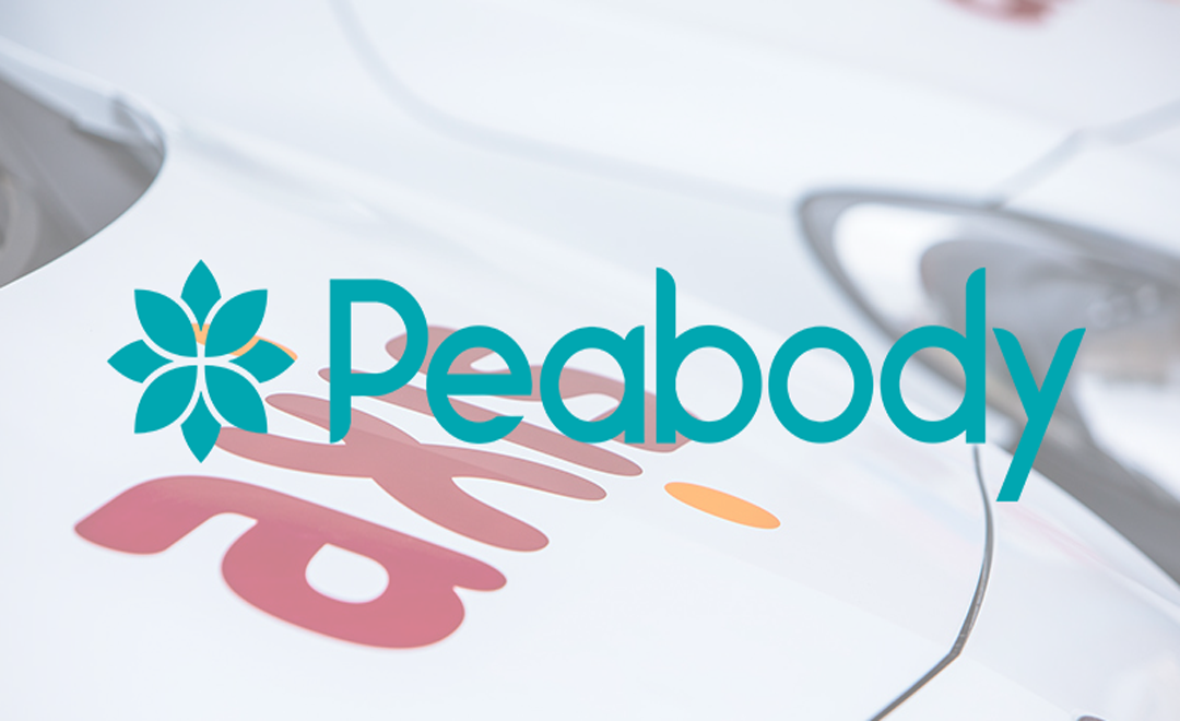 Peabody logo over vans