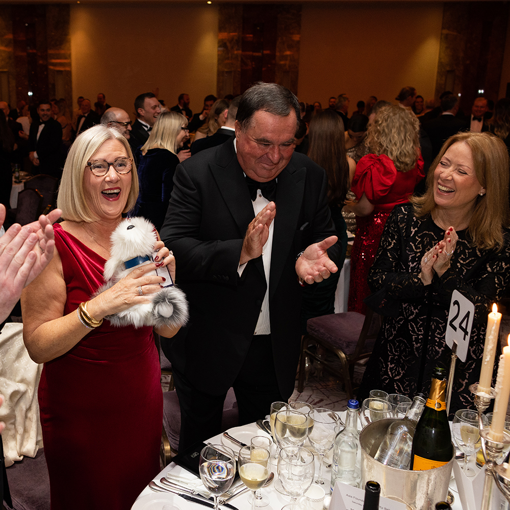 John Hayes CEO enjoying games that took place at the charity ball