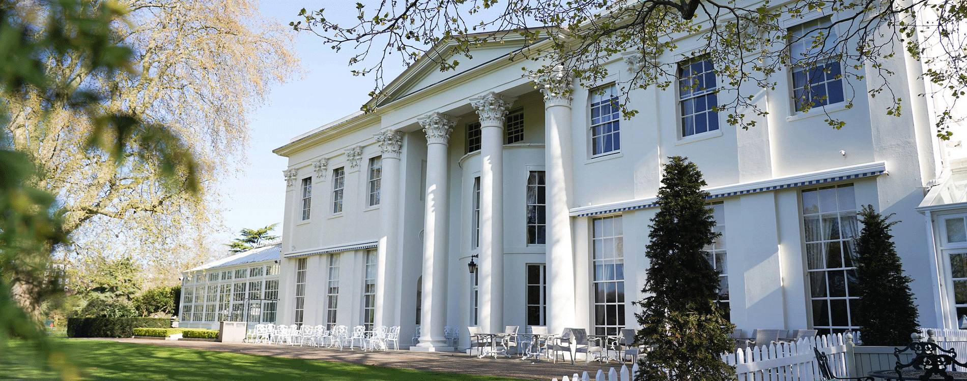 Exterior white pillars mansion Hurlingham