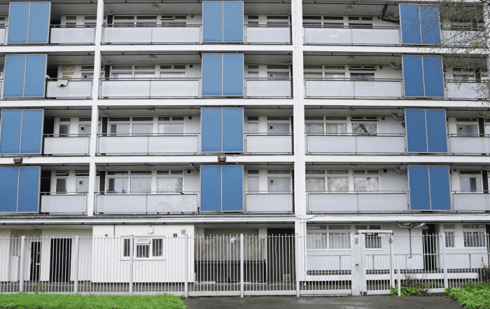 Block of white and blue flats.