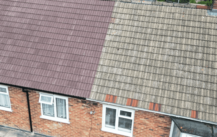 Purple and dark grey roof on a house. Looking down
