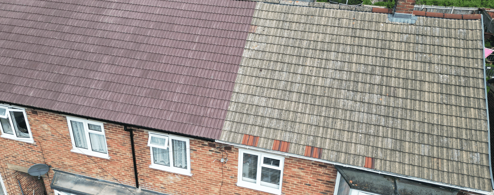 Purple and dark grey roof on a house. Looking down