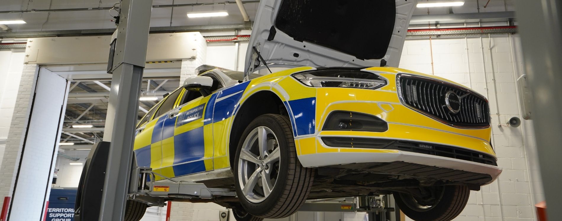 Metropolitan police car hanging for repairs and maintenance