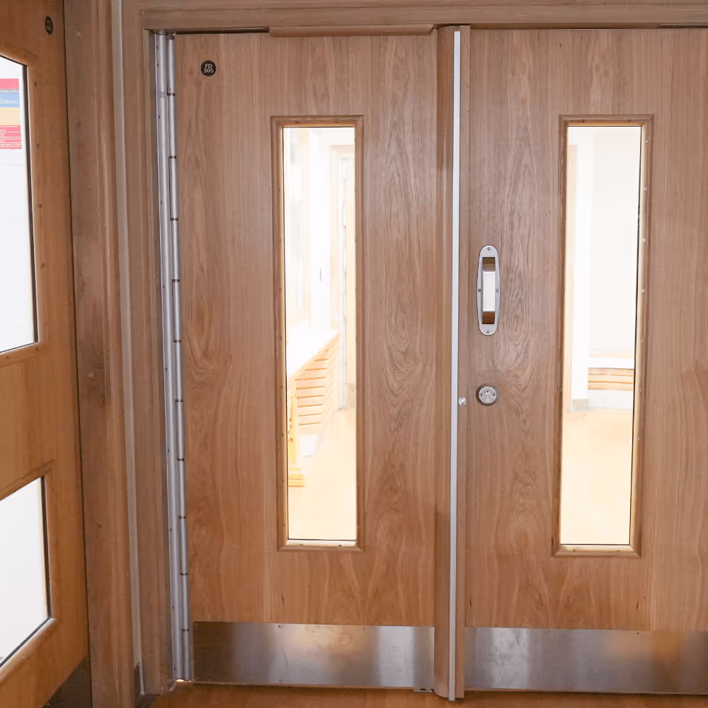 Construction team carrying out essential maintenance and refurbishment at an NHS hospital ward.