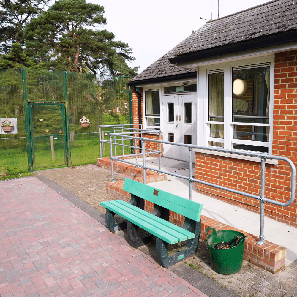 Work in progress on NHS facility exterior restoration to enhance durability and energy efficiency.