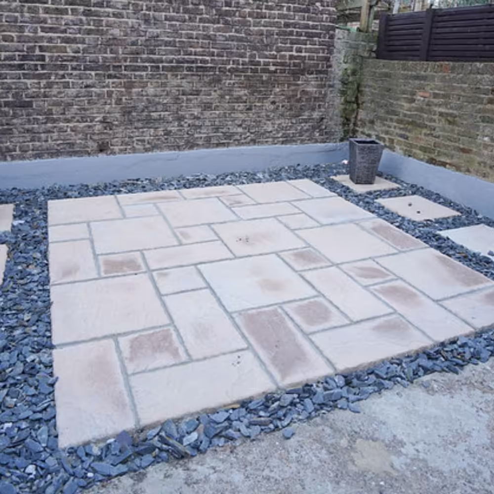 Construction site showing homes under energy retrofit, insulation, and conversion improvements.