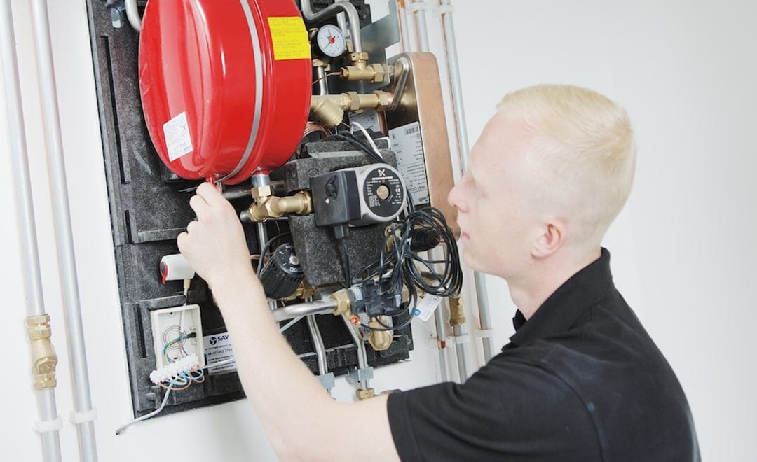 Axis operative working on a boiler in gas servicing success