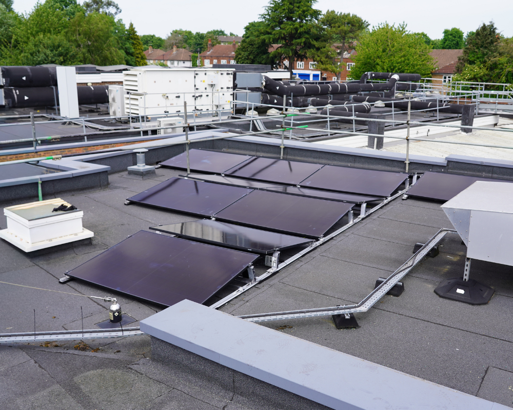 Solar panels on grey asphalt roof